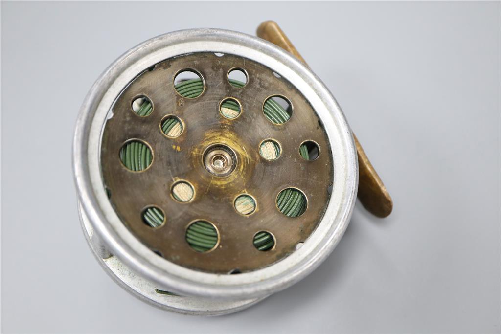 A Hardy No.5 fly reel with leather case